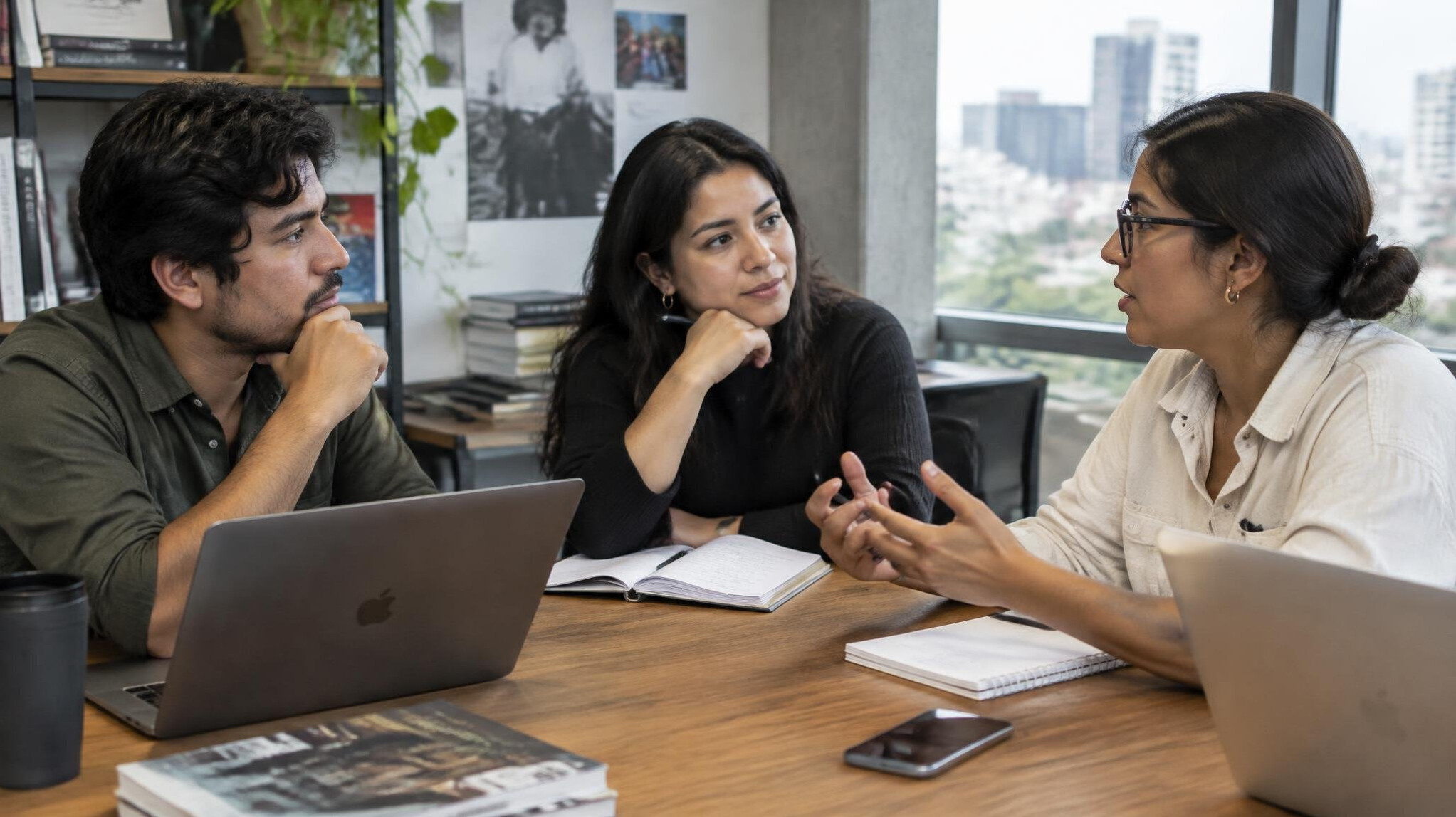 Colleagues having a conversation in a modern office